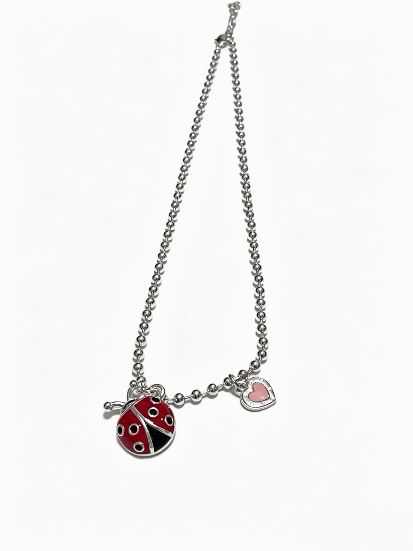 Tiffany & Co. Silver Beaded Necklace with Ladybug and Heart Charms